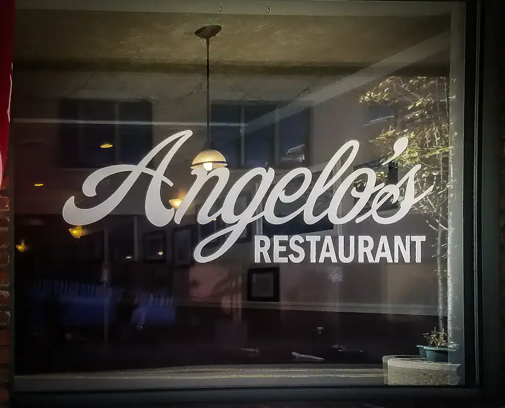 view of the front window of Angelo's Restaurant in Downtown Easton, PA