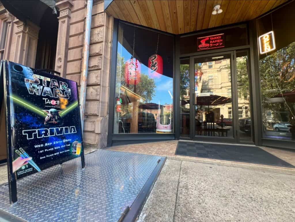 Takkii Ramen Easton restaurant entrance with a Star Wars-themed sign outside and traditional Japanese decor inside.